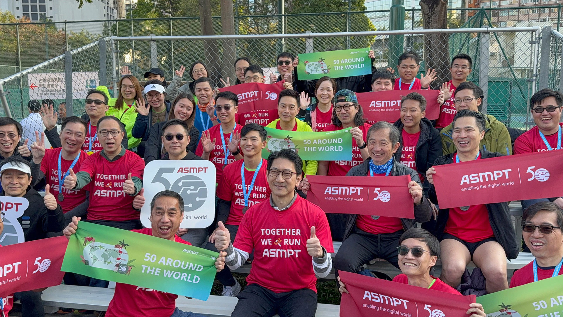 asmpt_50at50_10_-group-photo--joe-poh-and-10km-runners-after-race.jpg